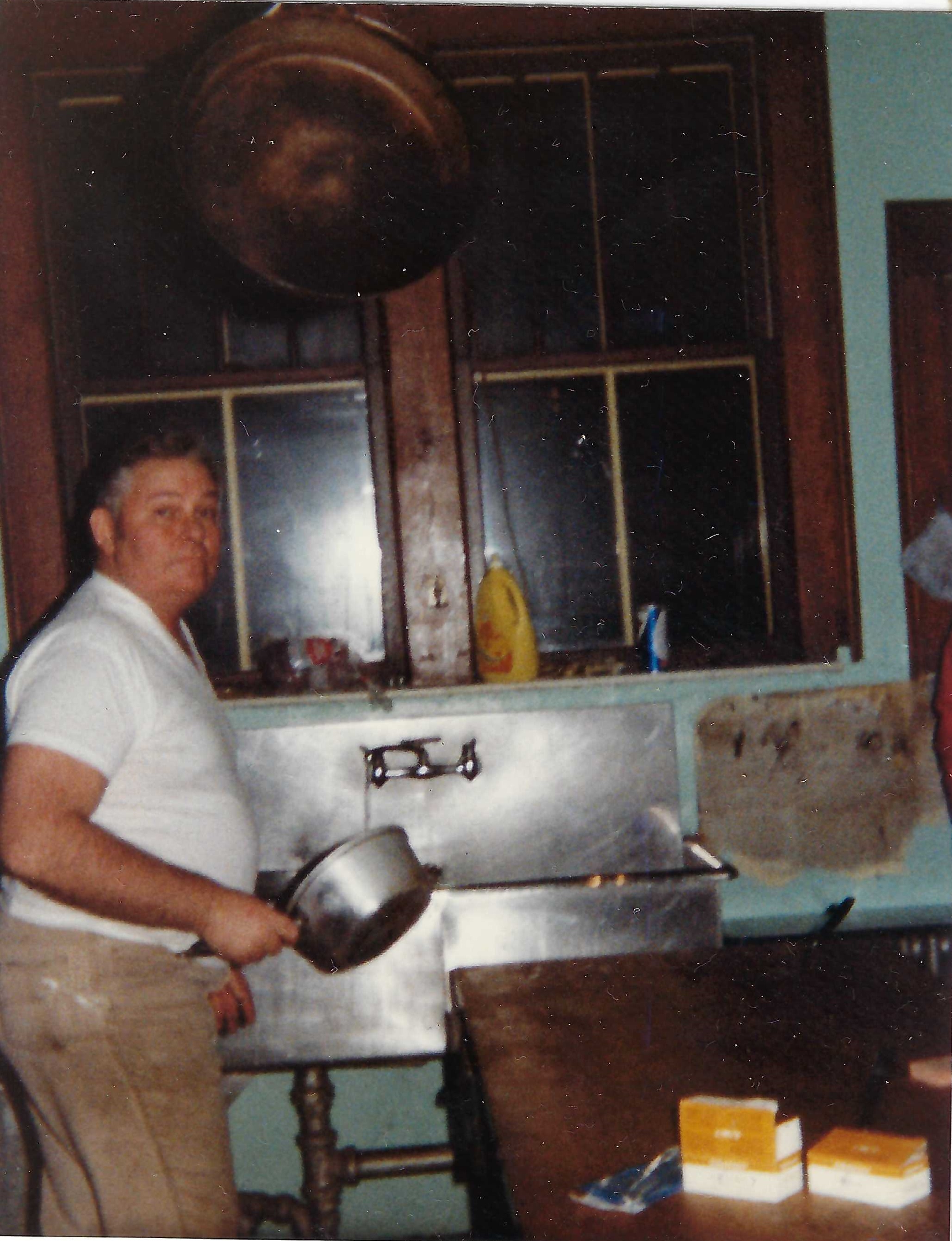 Bud Rue washing pots